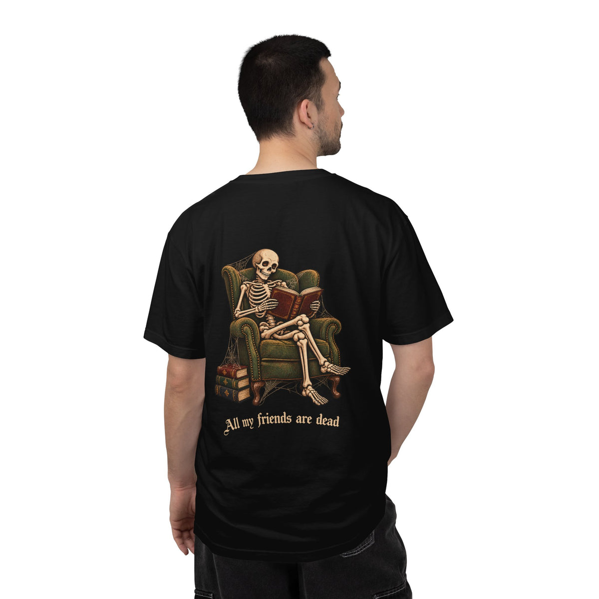 All My Friends Are Dead One More Chapter t-shirt: skeleton reading in an armchair