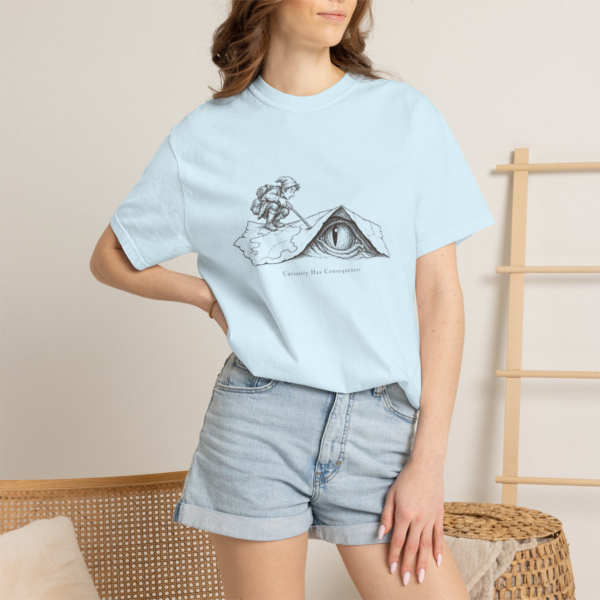 Curiosity Has Consequences t-shirt: vintage explorer at a mountain cave
